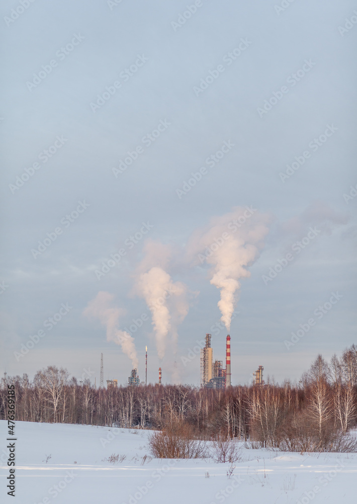 Petrochemical industrial factory of heavy industry, power refinery production with smoke pollution.Thick smoke is coming from the factory's chimney. smoke smog emissions bad ecology aerial photography Petrochemical industrial factory of heavy industry, power refinery production with smoke pollution.Thick smoke is coming from the factory's chimney. smoke smog emissions bad ecology aerial photography
