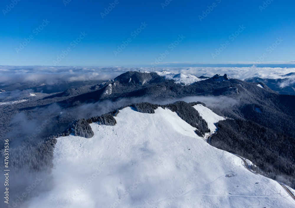 Fototapeta premium Landscape with the Rarau - Giumalau mountains seen in winter