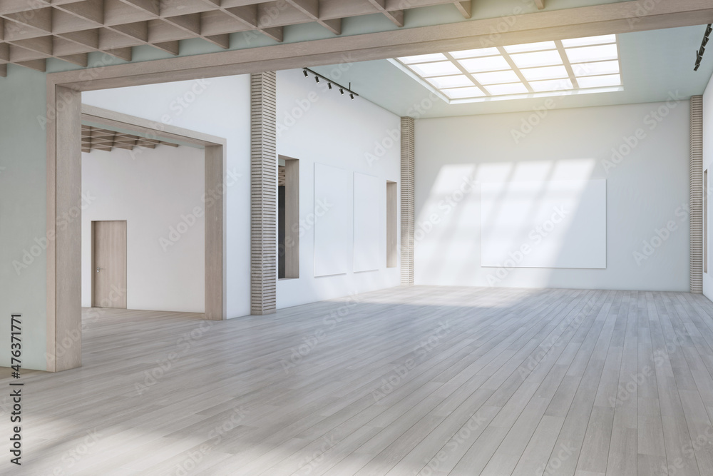 Obraz premium Luxury concrete exhibition hall interior with wooden flooring, empty posters and sunlight. Gallery concept. 3D Rendering.