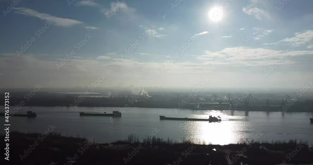 Winter river with ships and the port Winter river with ships and the port