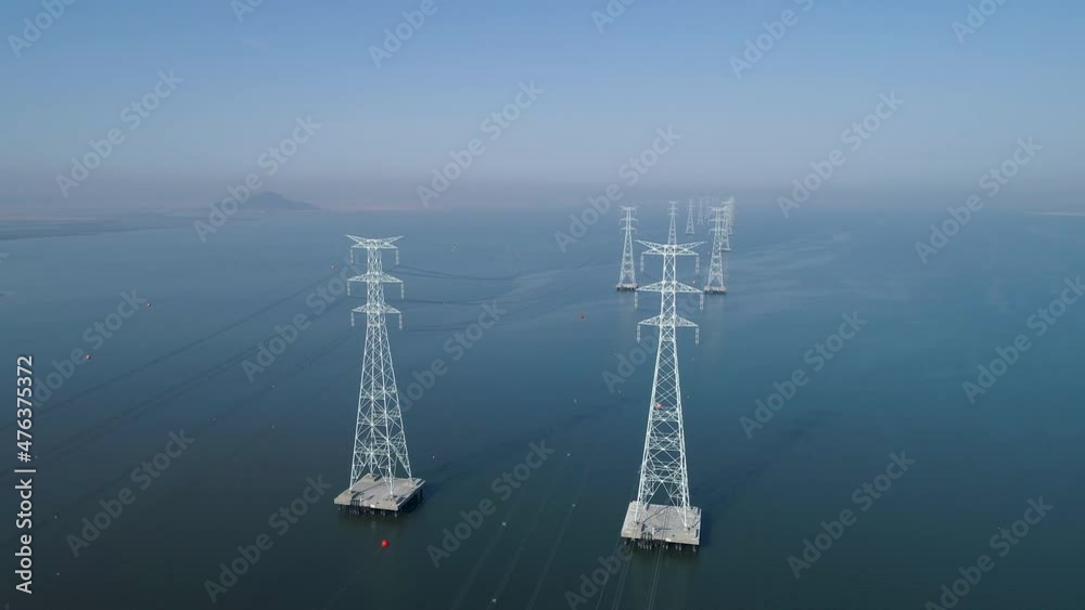 Aerial view of electric transmission tower above the sea, high voltage steel pylon, power, electric, energy, industry. 시화호, 철탑, 고압선, 송전탑. Aerial view of electric transmission tower above the sea, high voltage steel pylon, power, electric, energy, industry. 시화호, 철탑, 고압선, 송전탑.
