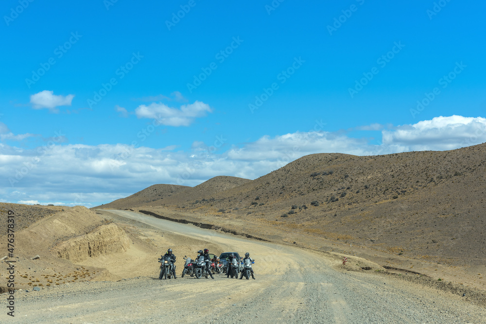 Group of motorcyclists on road 41 near El Chalten, Patagonia, Argentina