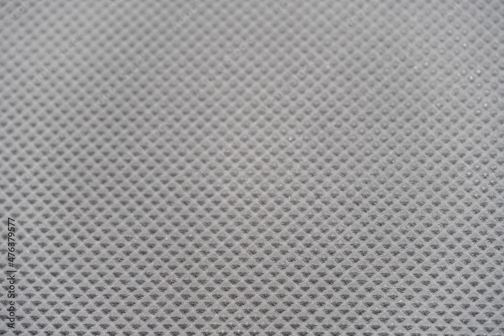 Black blank background for design or text insertion, corrugated rubber surface. Black blank background for design or text insertion, corrugated rubber surface.