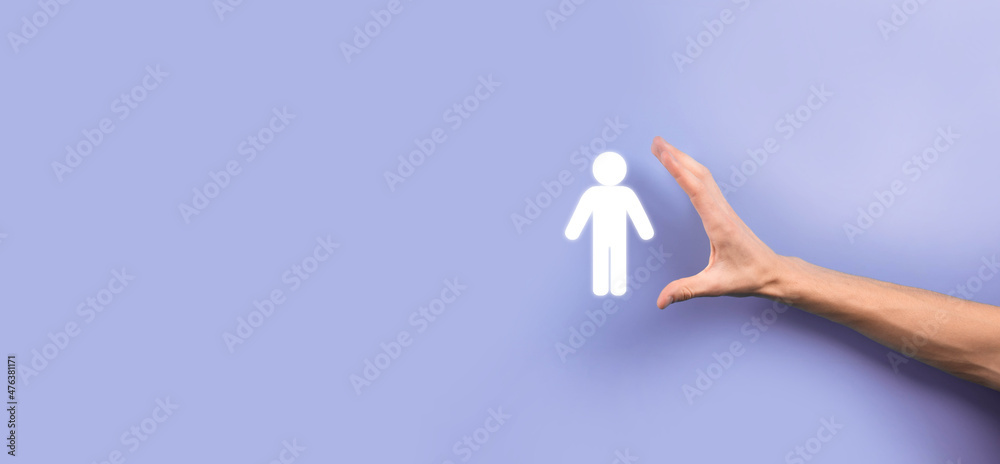 Male hand holding human icon on blue background. Human Resources HR management Recruitment Employment Headhunting Concept.Select team leader concept. Male hand click on man icon.Banner ,copy spase. Male hand holding human icon on blue background. Human Resources HR management Recruitment Employment Headhunting Concept.Select team leader concept. Male hand click on man icon.Banner ,copy spase.