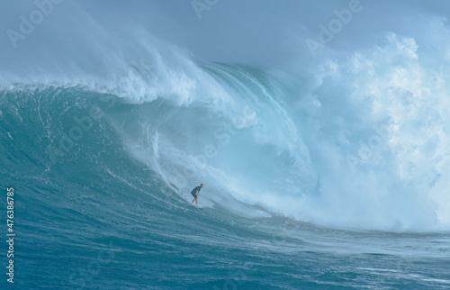 Fototapeta Naklejka Na Ścianę i Meble -  Sport photography. Jaws swell on International surfing event in Maui, Hawai 2021 December.