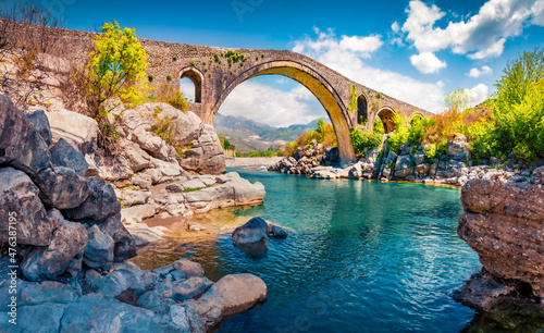 Stunning spring view of Old Mes Bridge. Gorgeous morning landscape of Shkoder. Colorful outdoor scene of Albania, Europe. Traveling concept background. photo