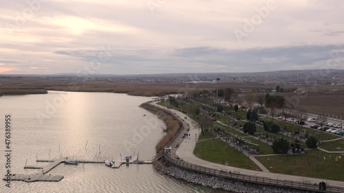 Lake Mogan and barbecue park just near the lake at sunset, Golbasi, Ankara, Turkey photo