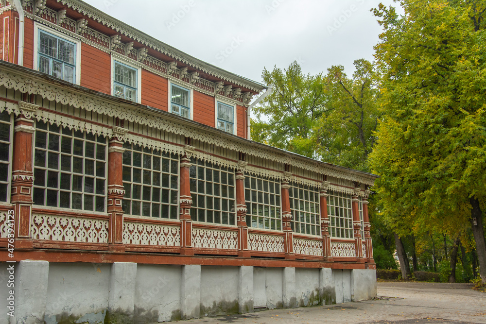 Red and white wooden carved facade of the 19th century building of the former Noble Assembly Summer Club in Ryazan