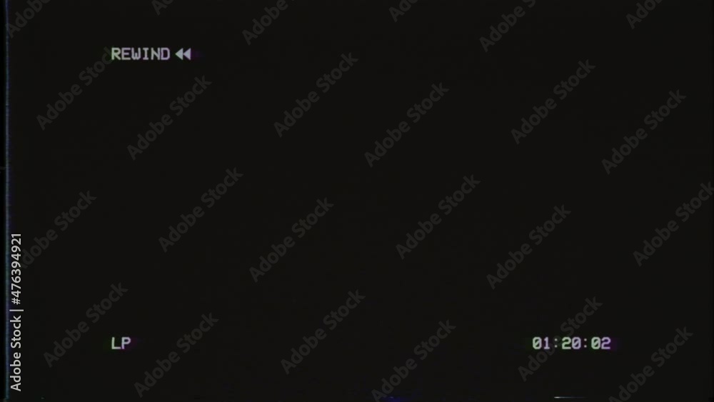 VCR Rewind symbol interface overlay. VHS defects, artifacts and noise. Glitches of old damaged tape cassettes. Static TV noise. Overlay Screen mode footage