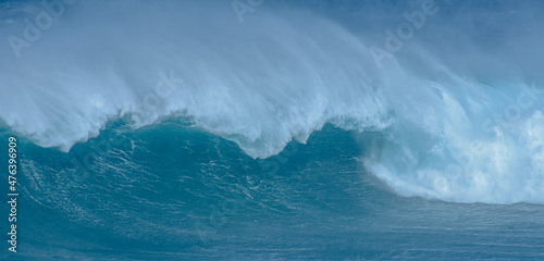 Fototapeta Naklejka Na Ścianę i Meble -  Sport photography. Jaws swell on International surfing event in Maui, Hawai 2021 December.
