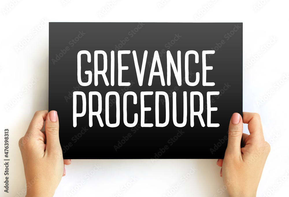 Grievance procedure text on card, concept background Grievance procedure text on card, concept background