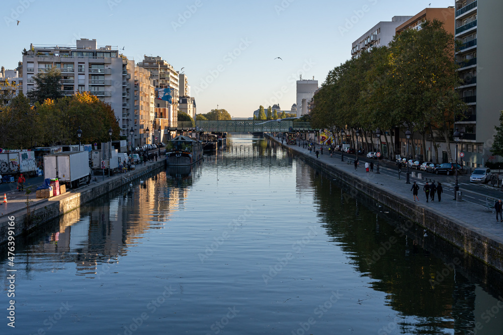Paris, France - 10 24 2021: View of the Ourcq canal from the lift bridge at sunrise