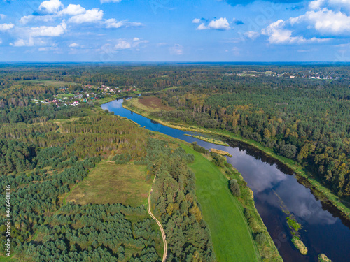 Flight over the river, river in the forest from a bird eye view