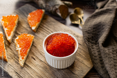 red caviar on a spoon