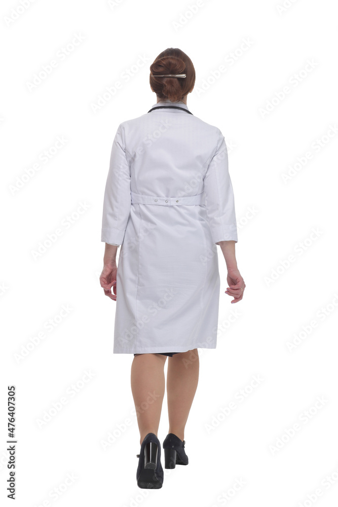 female doctor with a stethoscope striding forward . female doctor with a stethoscope striding forward .