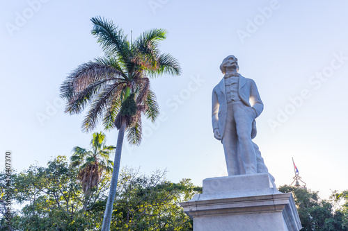 Statue of Jose Martion the background of trees and buildings. Cuba. Havana