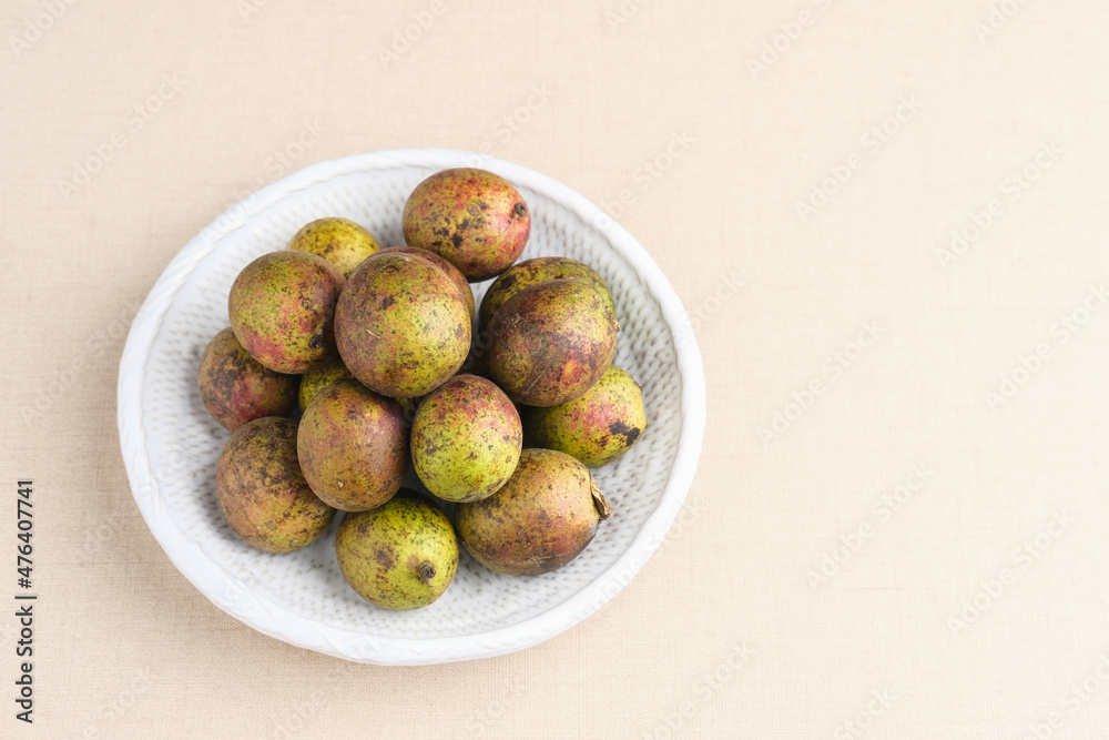 Matoa fruit from Papua, Indonesia. Matoa contains vitamin, nutrients and antioxidant. Selective focus image.
Matoa fruit from Papua, Indonesia. Matoa contains vitamin, nutrients and antioxidant. Selective focus image.