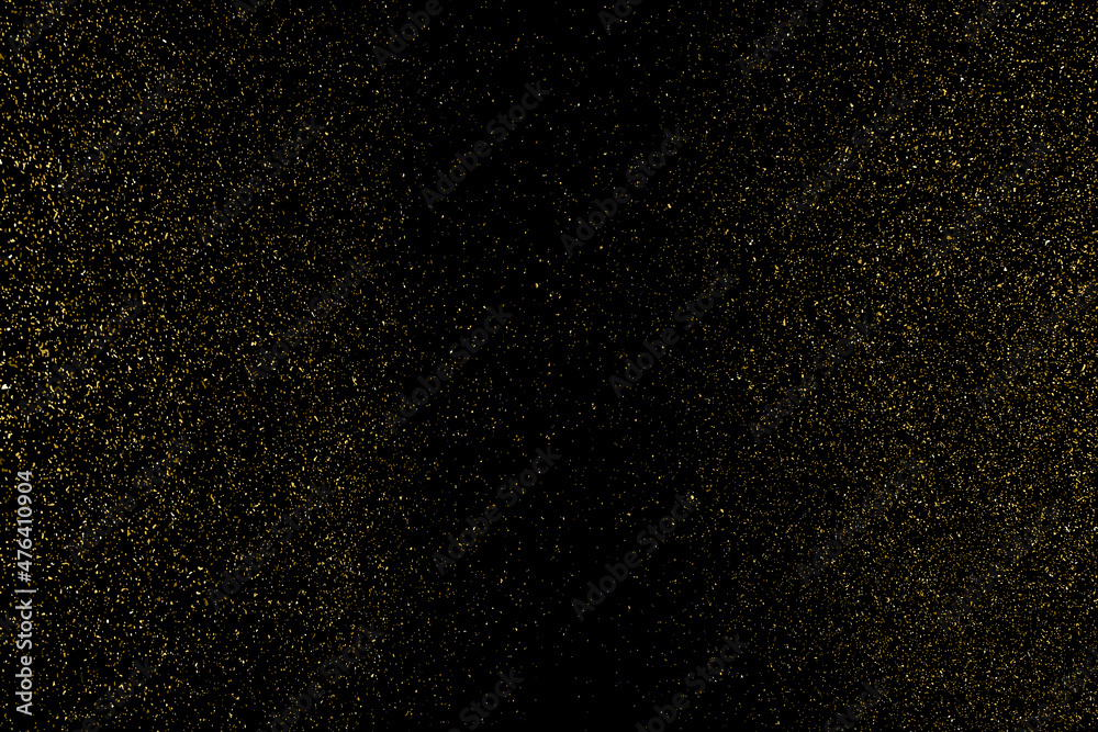 Gold Glitter Texture Isolated on Black Background. Golden stardust. Amber Particles Color. Sparkles Rain. Vector Illustration, Eps 10.