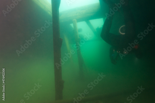 Diver in the cargo hold of the Bermuda shipwreck in the Alger Underwater Preserve in Lake Superior © Focused Adventures
