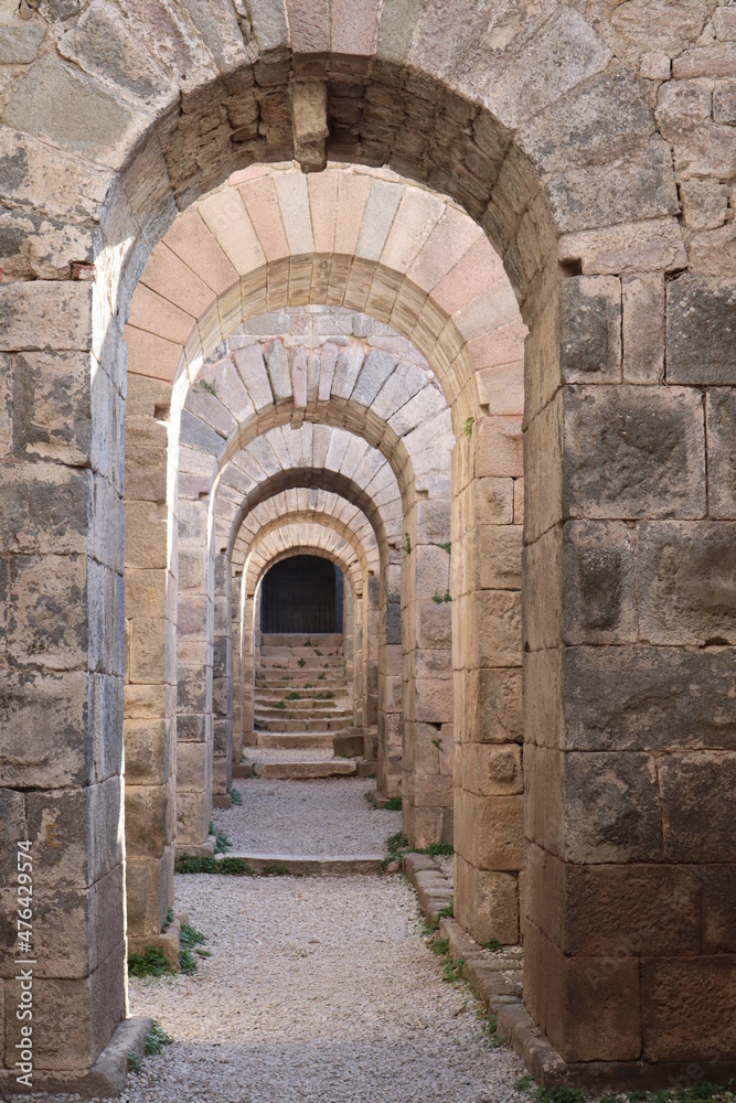 beautiful ancient old stone arch corridor in the ruins of Pergamon city in Turkey