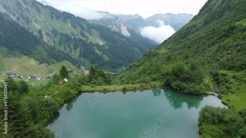 Drone shot over mountain lake