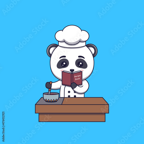 Cute panda chef cooking while looking at the recipe book
