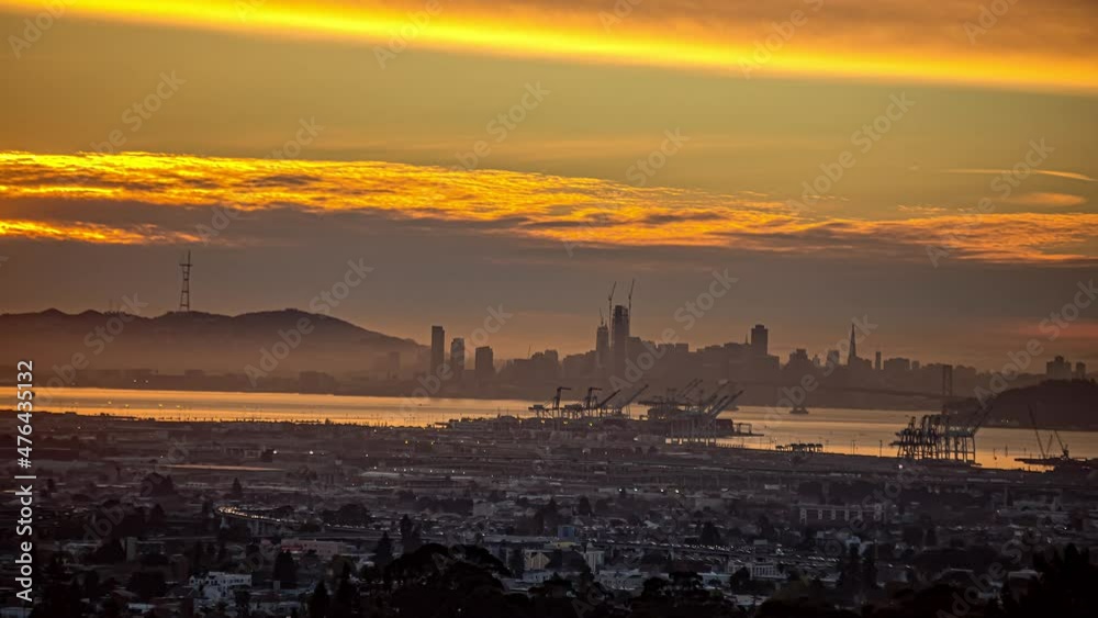 View of San Francisco port, California, United States with skyscrapers in the background. Sunset timelapse video of the port with beautiful golden hue. View of San Francisco port, California, United States with skyscrapers in the background. Sunset timelapse video of the port with beautiful golden hue.