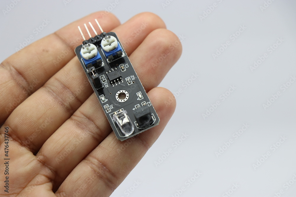 Infrared line tracking sensor module sensor for arduino projects held in hand Infrared line tracking sensor module sensor for arduino projects held in hand