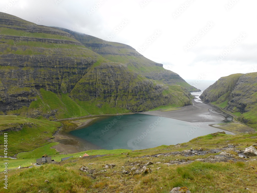 The beautiful Atlantic coastline and islets on the Faroe Islands