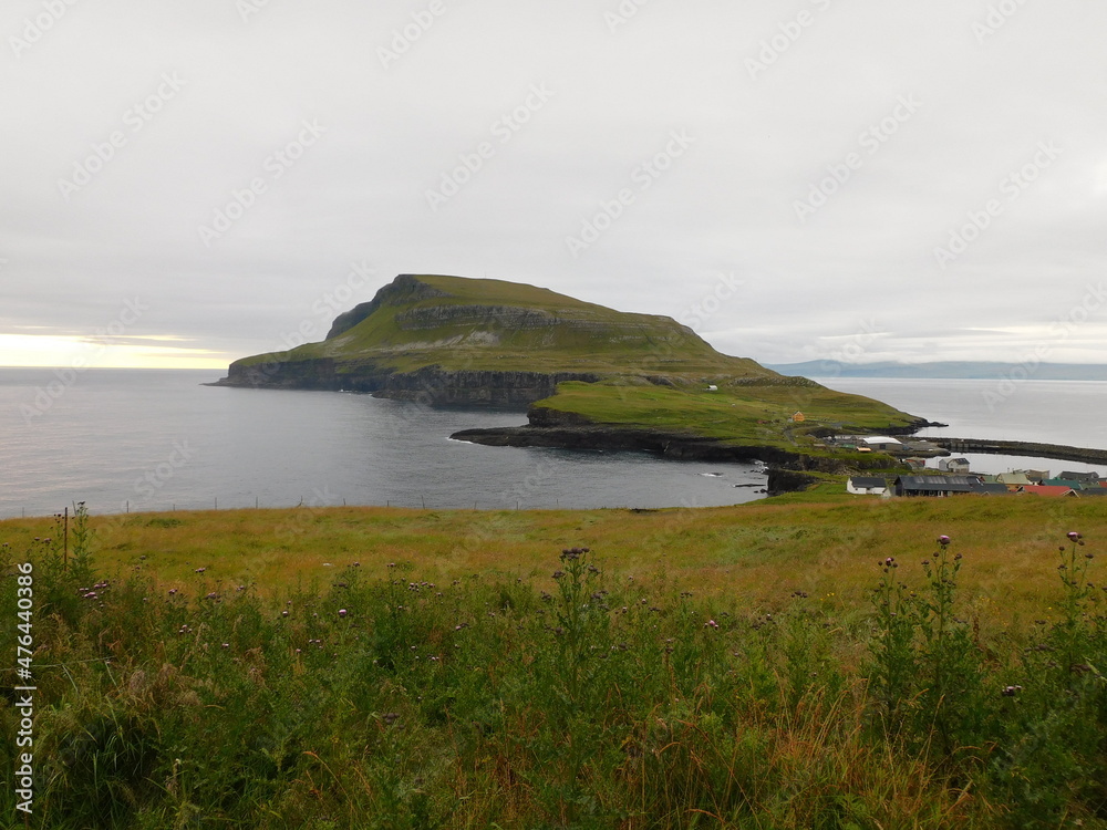 Traveling through the mountains and beaches of the Faroe Islands Traveling through the mountains and beaches of the Faroe Islands