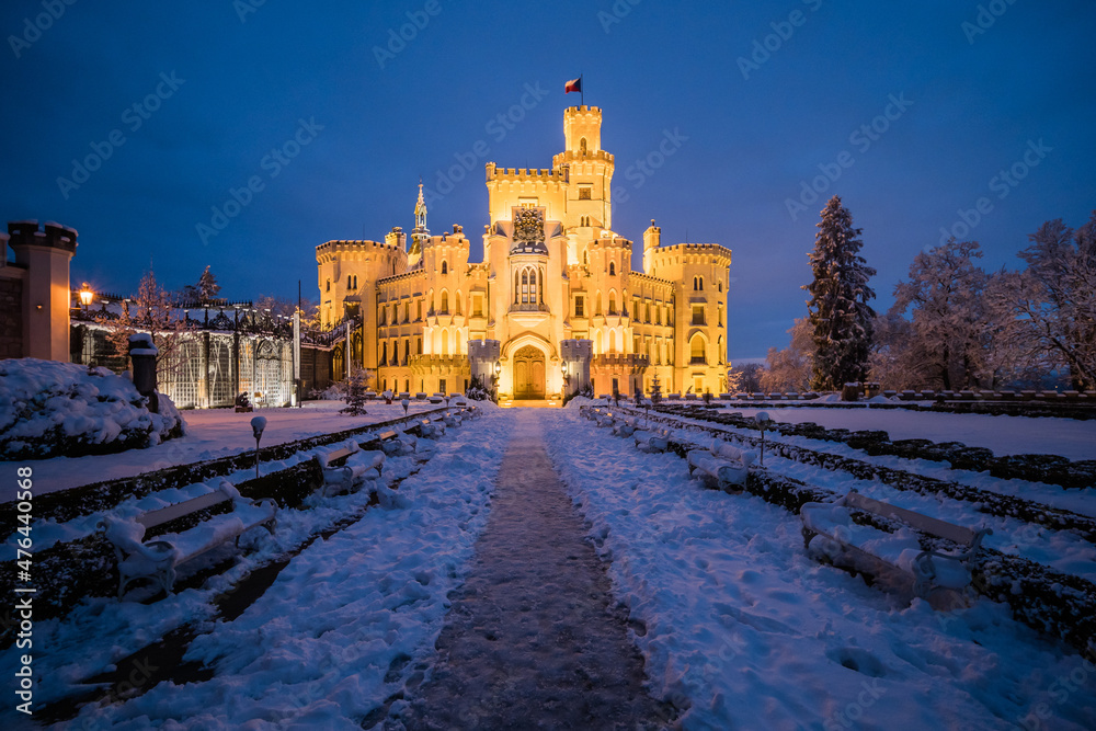 Famous castle Hluboka nad Vltavou in the Czech Republic in winter in the evening