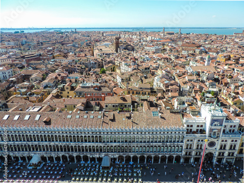 View of part of Basilica di San Marco and the Torre dell'Orologio from a viewpoint at San Marco's Bell Tower - Venice, Italy photo