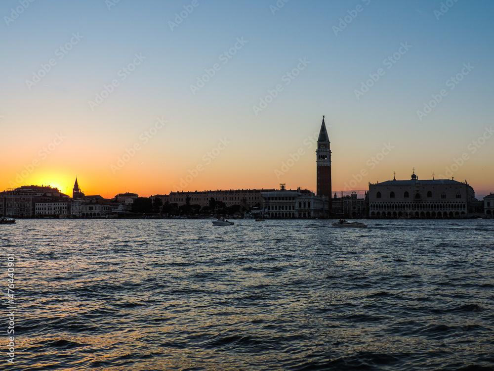 View of the Doge's Palace and Venice's bell tower during a beautiful sunset - Venice, Italy