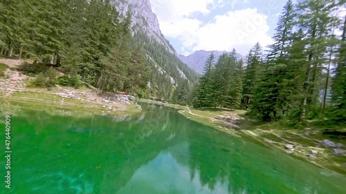 Grüner See Styria, Tragöss, Austria FPV drone arial with mountain view and green water