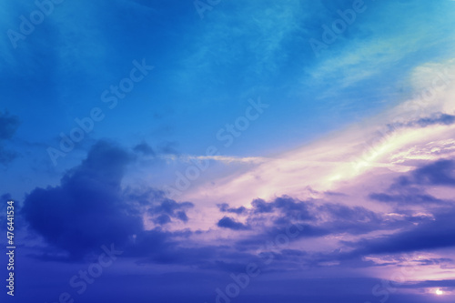 Colorful cloudy sky over the sea at sunset. Gradient color. Sky texture. Abstract nature background