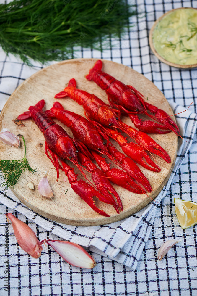 River Cooked Red Crawfish. Boiled crayfish with dill on wooden background River Cooked Red Crawfish. Boiled crayfish with dill on wooden background
