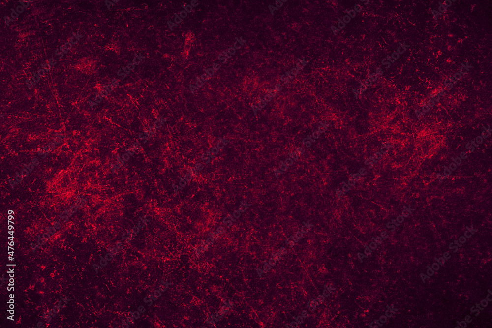 Red grunge textures on a dark metal sheet with scratches for background
