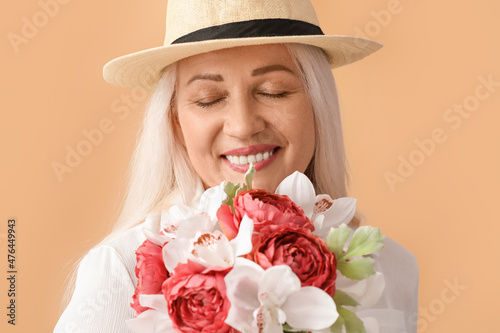 Smiling mature woman with c...