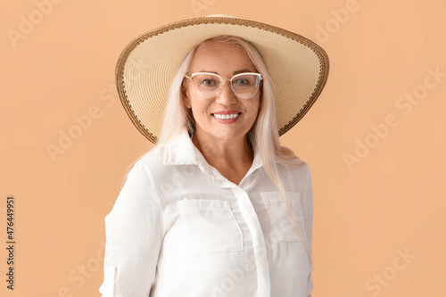 Mature woman in stylish hat...