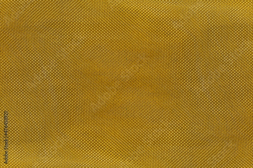 Abstract golden texture on cotton fabric for background