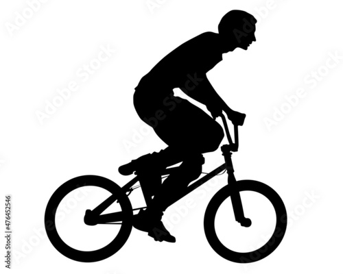 Young athlete on a bike for extreme stunts. Isolated silhouette on a white background