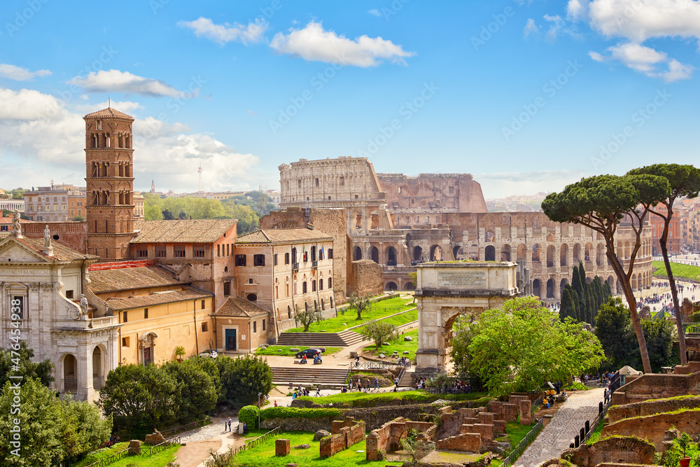 Roman forum ancient ruins and Colosseum in Rome, Italy