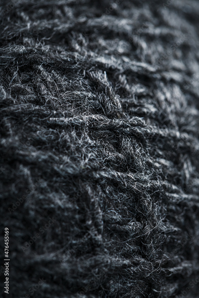 Gray threads of natural wool close-up in full screen. Gray threads of natural wool close-up in full screen.