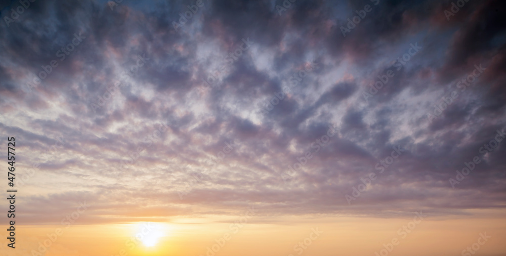 Cumulus clouds in the sky at dawn. For background and layer.
