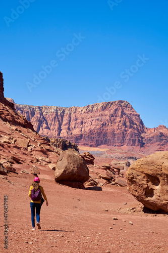 Woman hiking in Glen Canyon National Recreation Area, Utah.