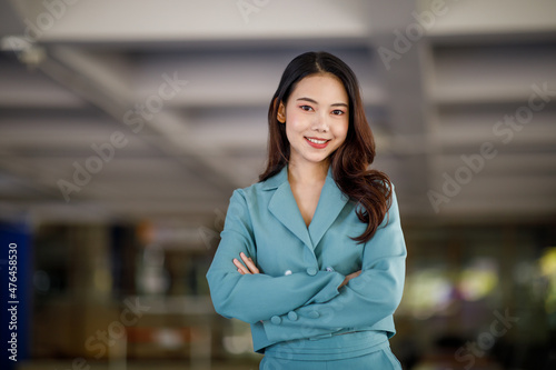 Modern Asian business woman in the office with copy space
