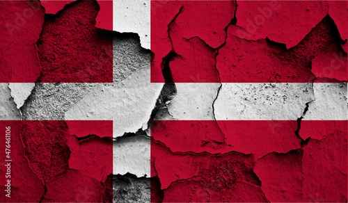Flag of Denmark on old grunge wall in background 