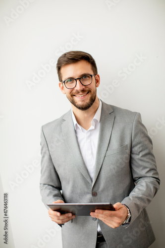 Young modern businessman us...