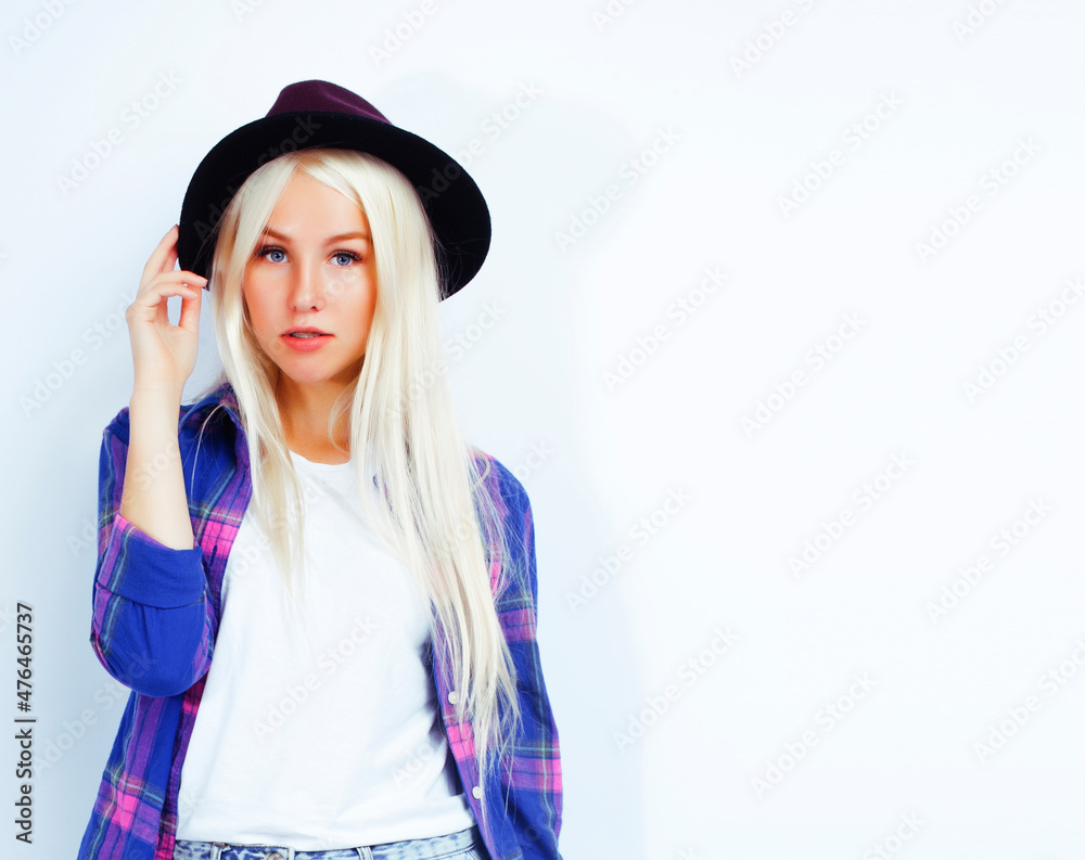 young pretty stylish blond hipster girl in hat posing emotional isolated on white background, lifestyle people concept young pretty stylish blond hipster girl in hat posing emotional isolated on white background, lifestyle people concept