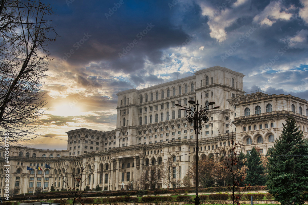 Palace Of The Parliament With A Dramatic Sky, Located In The Center Of Bucharest, Romania. Travels And Tourism. Famous Architecture And Buildings.  Eastern Europe